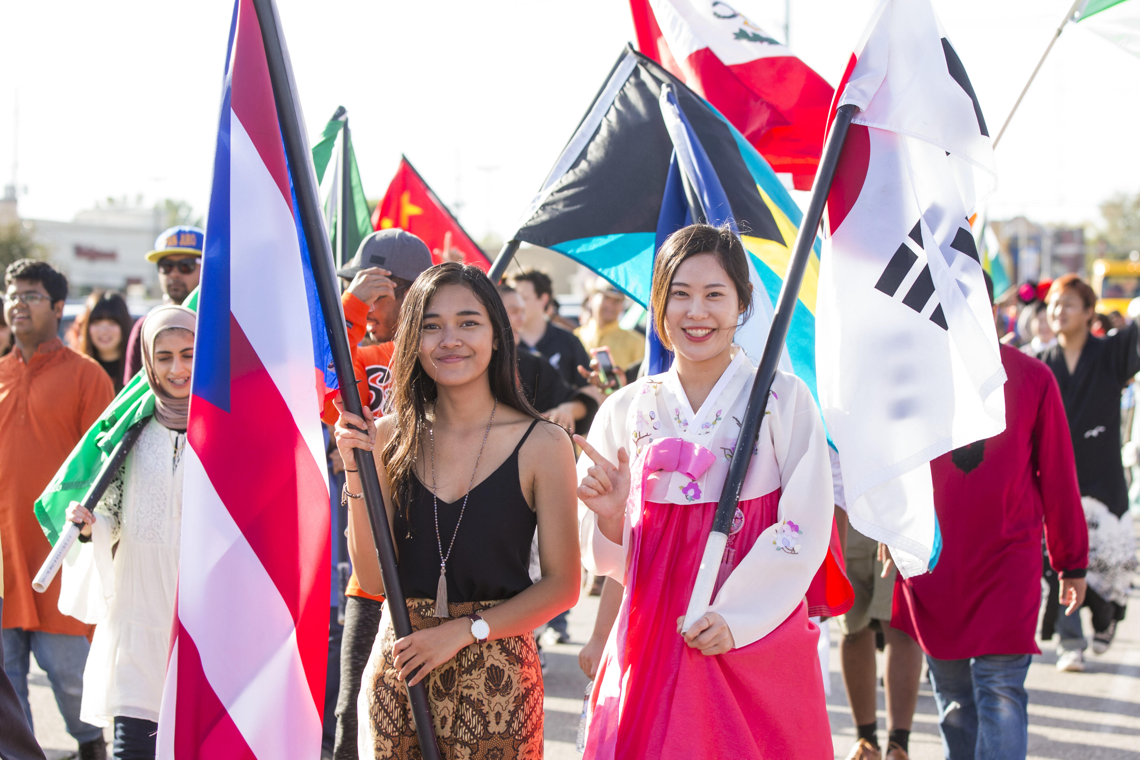 International Students holding flags